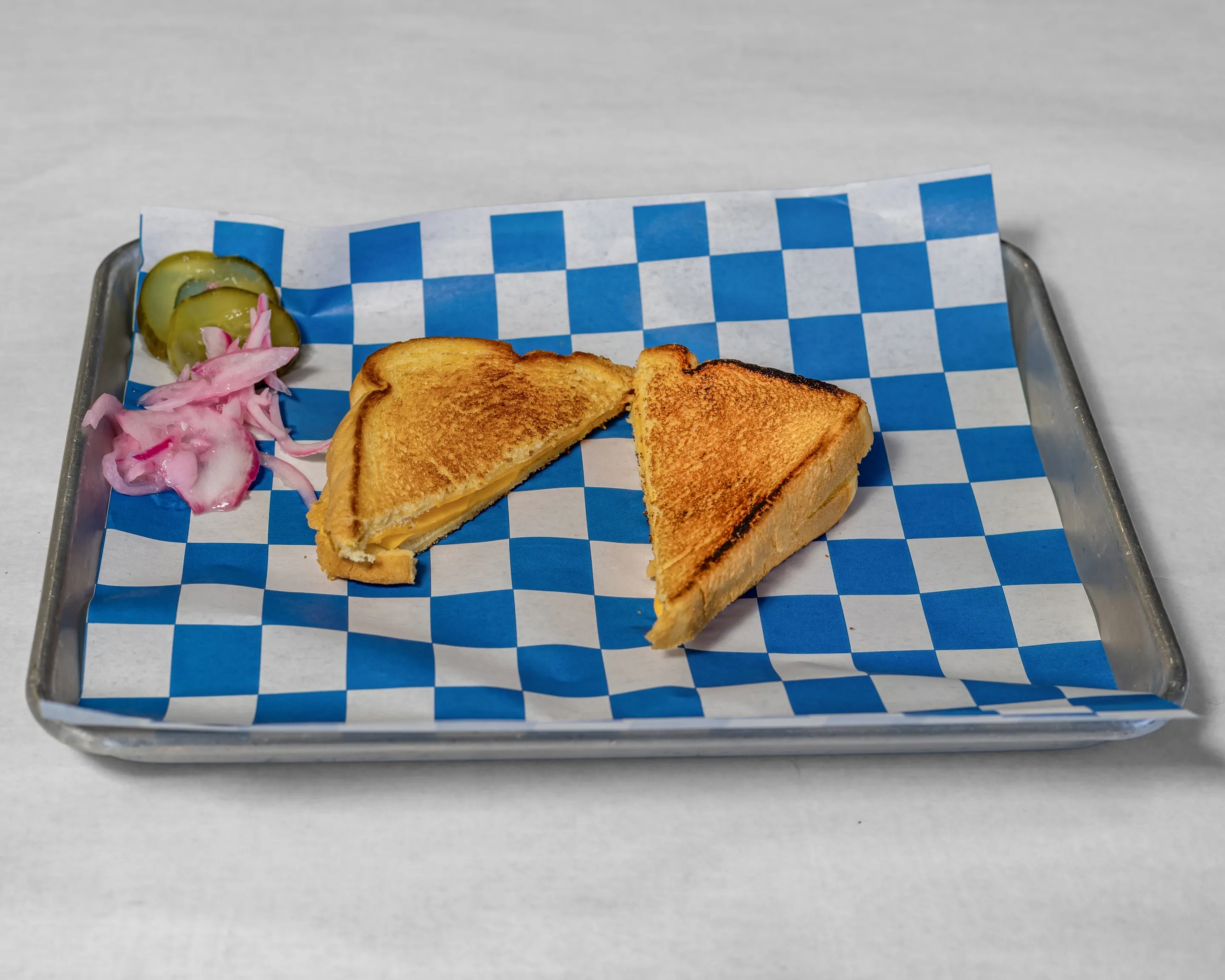 Brisket grilled cheese sandwich from Timmy Jon’s BBQ in Dade City, FL, with smoked brisket and melted cheese on toasted bread